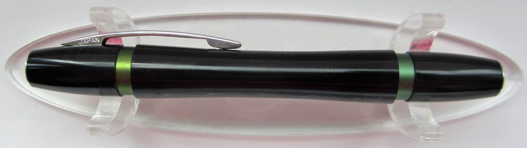 Ohto Rook fountain pen in green and black colorway, capped